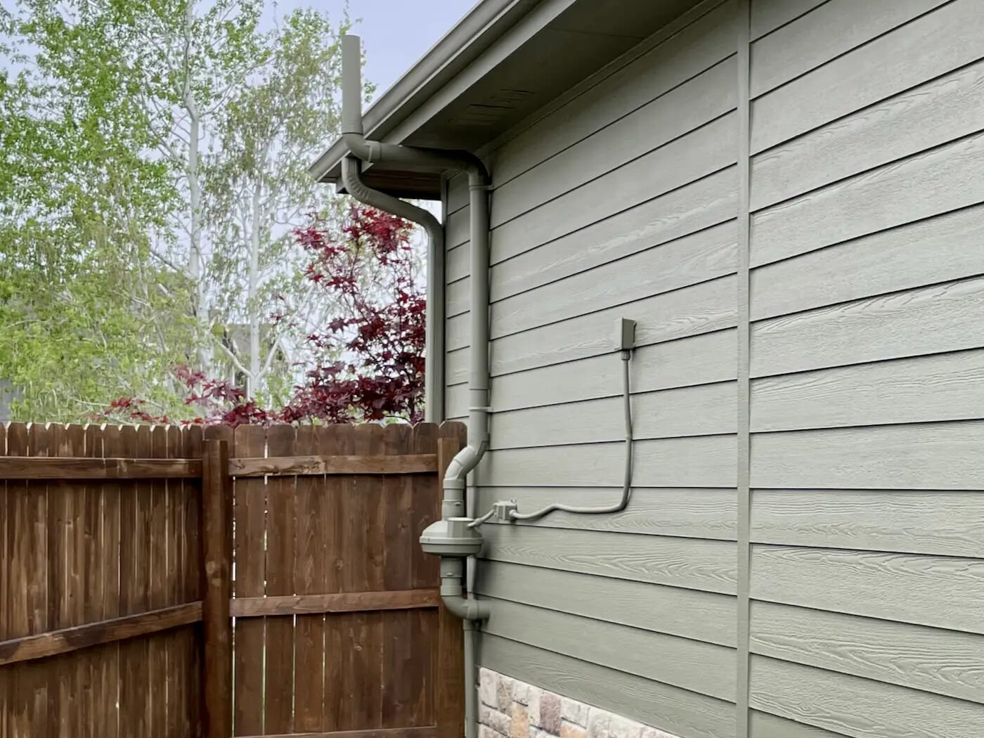Radon Mitigation System With Fan Installed on Exterior of Home in Omaha, Nebraska